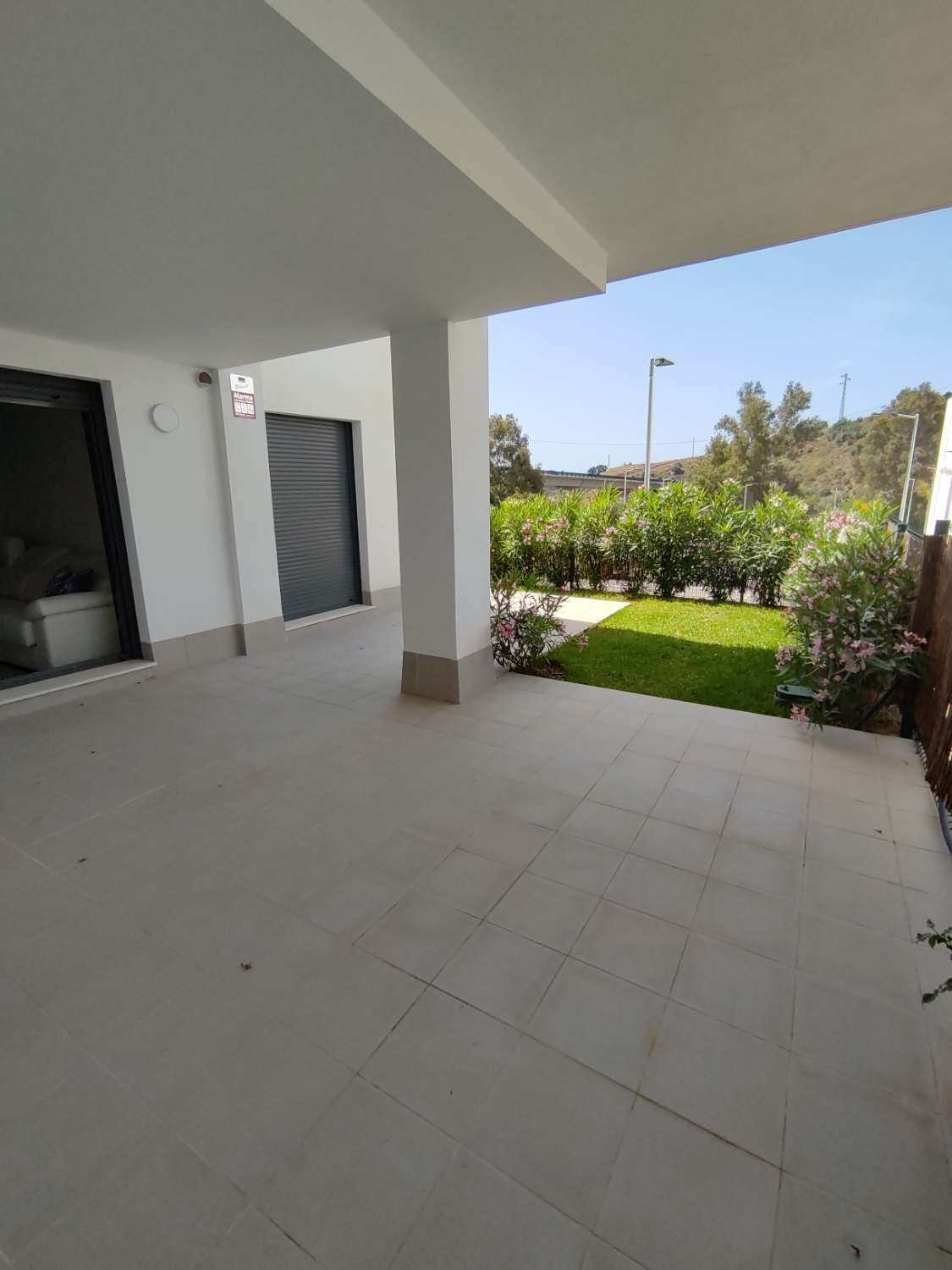 La cala, beautiful ground floor apartment with private terrace and landscaped garden of over 70m.  There are 3 double bedrooms,