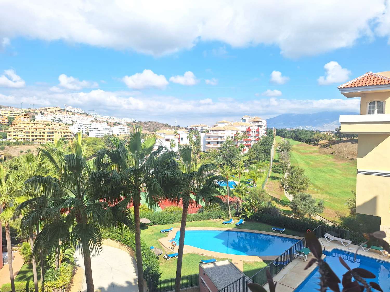 Splendid 2 Bedroom Apartment Steps from the Golf Club with Terrace, Garage and Community Pool in Mijas, Málaga